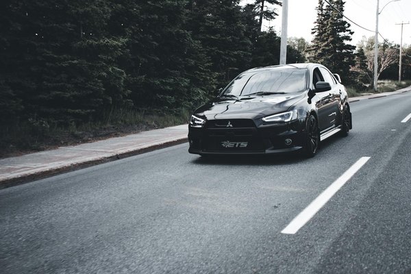 How is the UK automotive sector contributing to regional economic development?